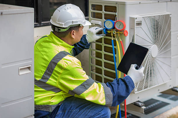 Professional Hvac technician working in Wilson, AR